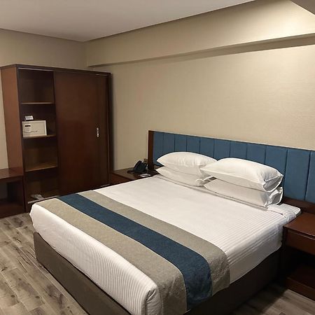 Stay Inn Pyramids Hotel Al Kawm al Akhdar Bagian luar foto