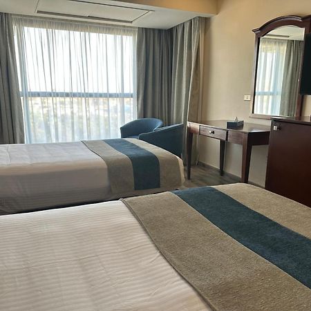 Stay Inn Pyramids Hotel Al Kawm al Akhdar Bagian luar foto