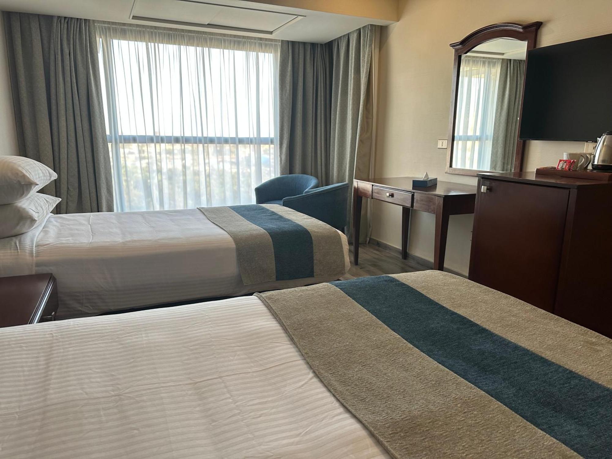 Stay Inn Pyramids Hotel Al Kawm al Akhdar Bagian luar foto