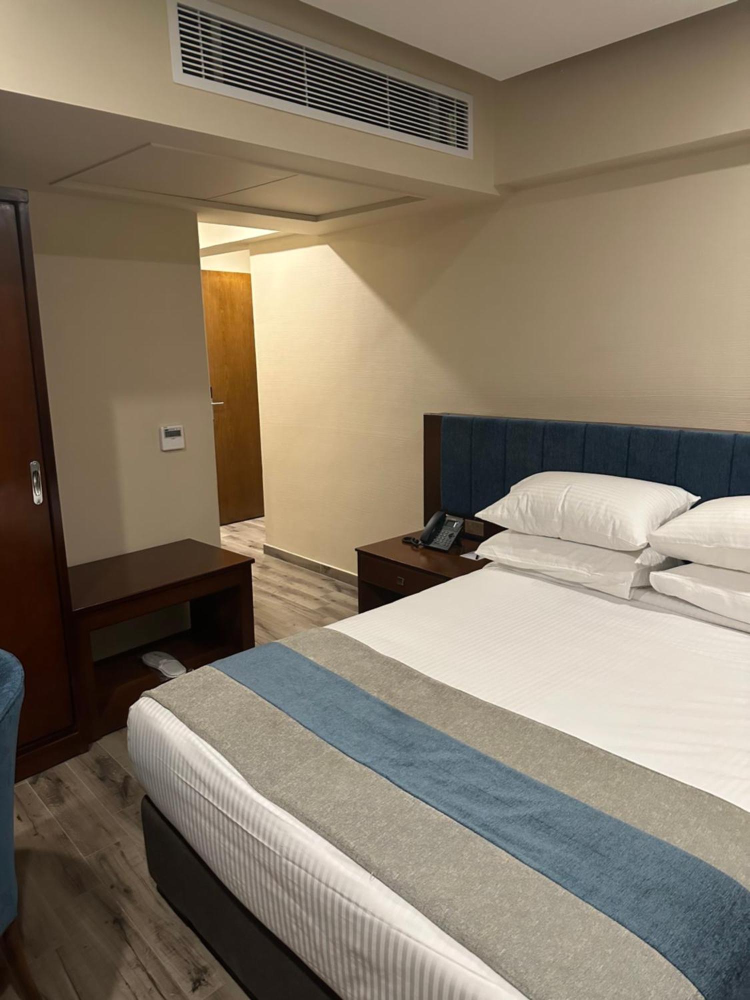 Stay Inn Pyramids Hotel Al Kawm al Akhdar Bagian luar foto
