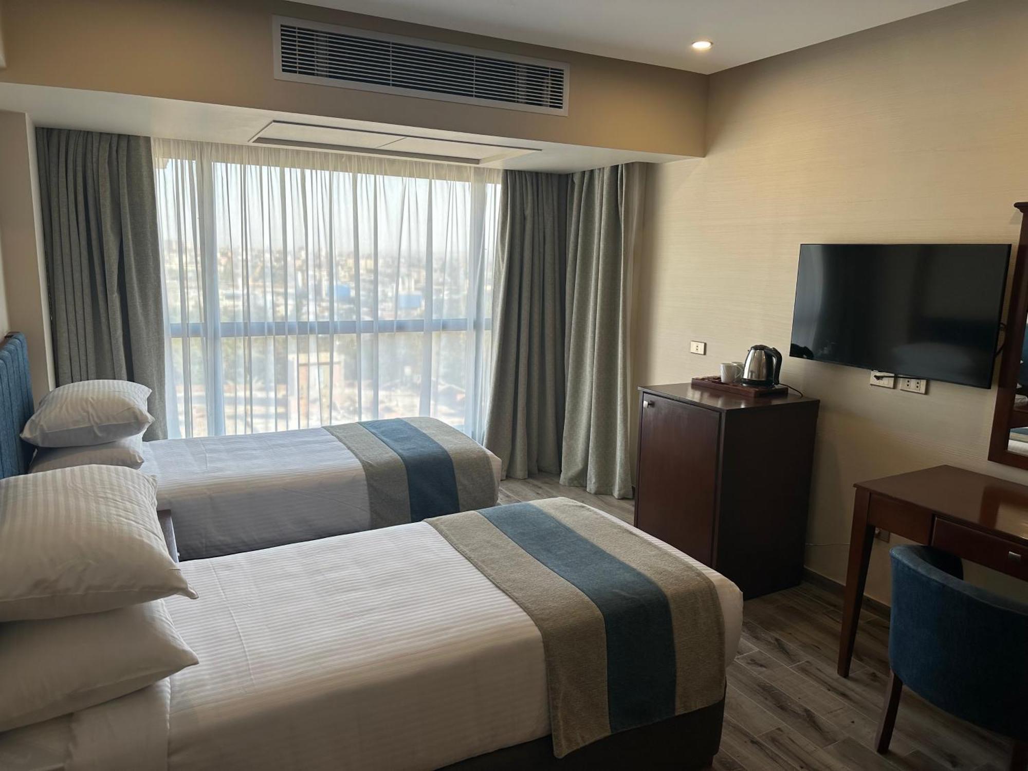 Stay Inn Pyramids Hotel Al Kawm al Akhdar Bagian luar foto