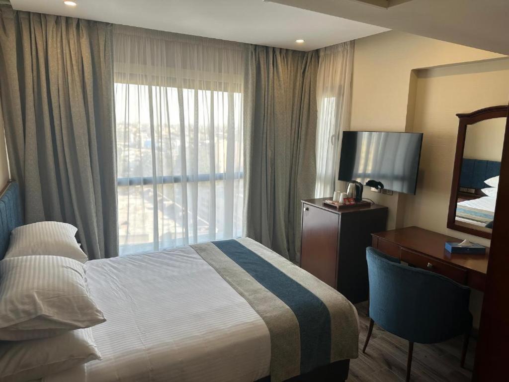 Stay Inn Pyramids Hotel Al Kawm al Akhdar Bagian luar foto