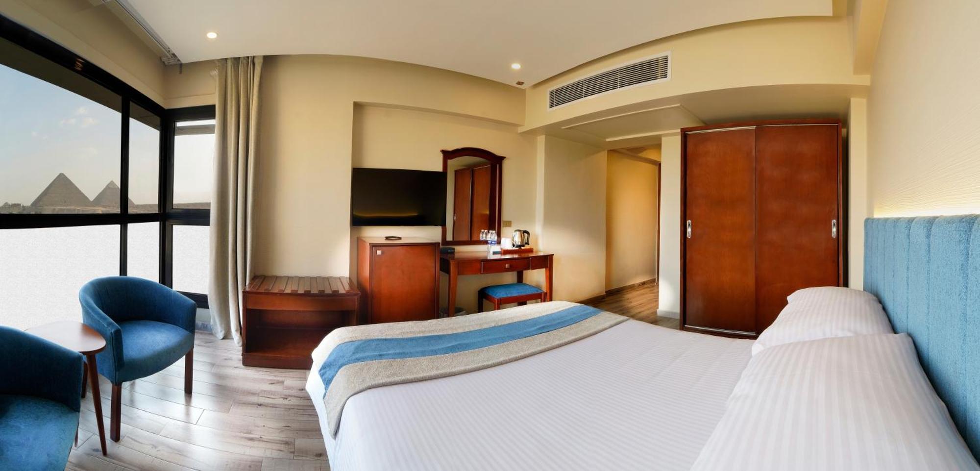 Stay Inn Pyramids Hotel Al Kawm al Akhdar Bagian luar foto