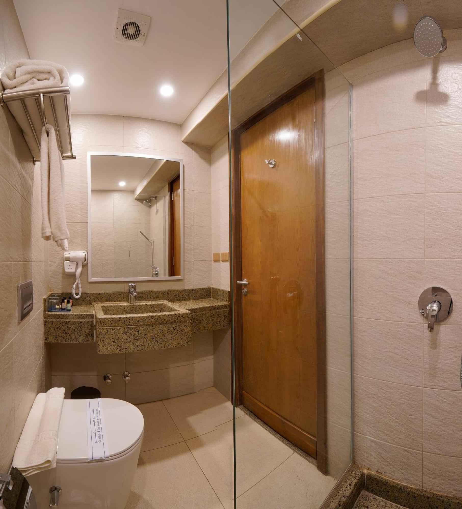 Stay Inn Pyramids Hotel Al Kawm al Akhdar Bagian luar foto