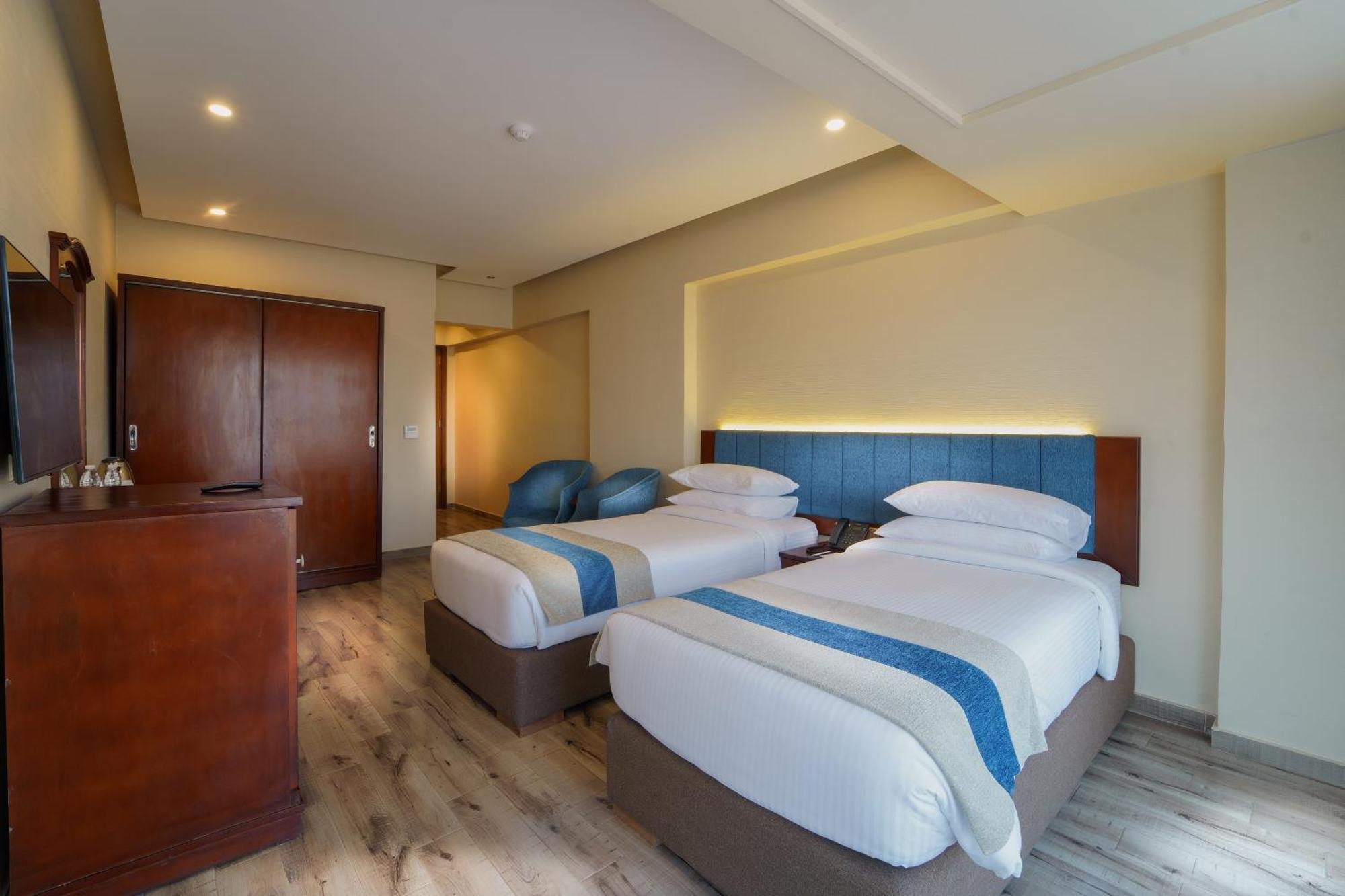 Stay Inn Pyramids Hotel Al Kawm al Akhdar Bagian luar foto