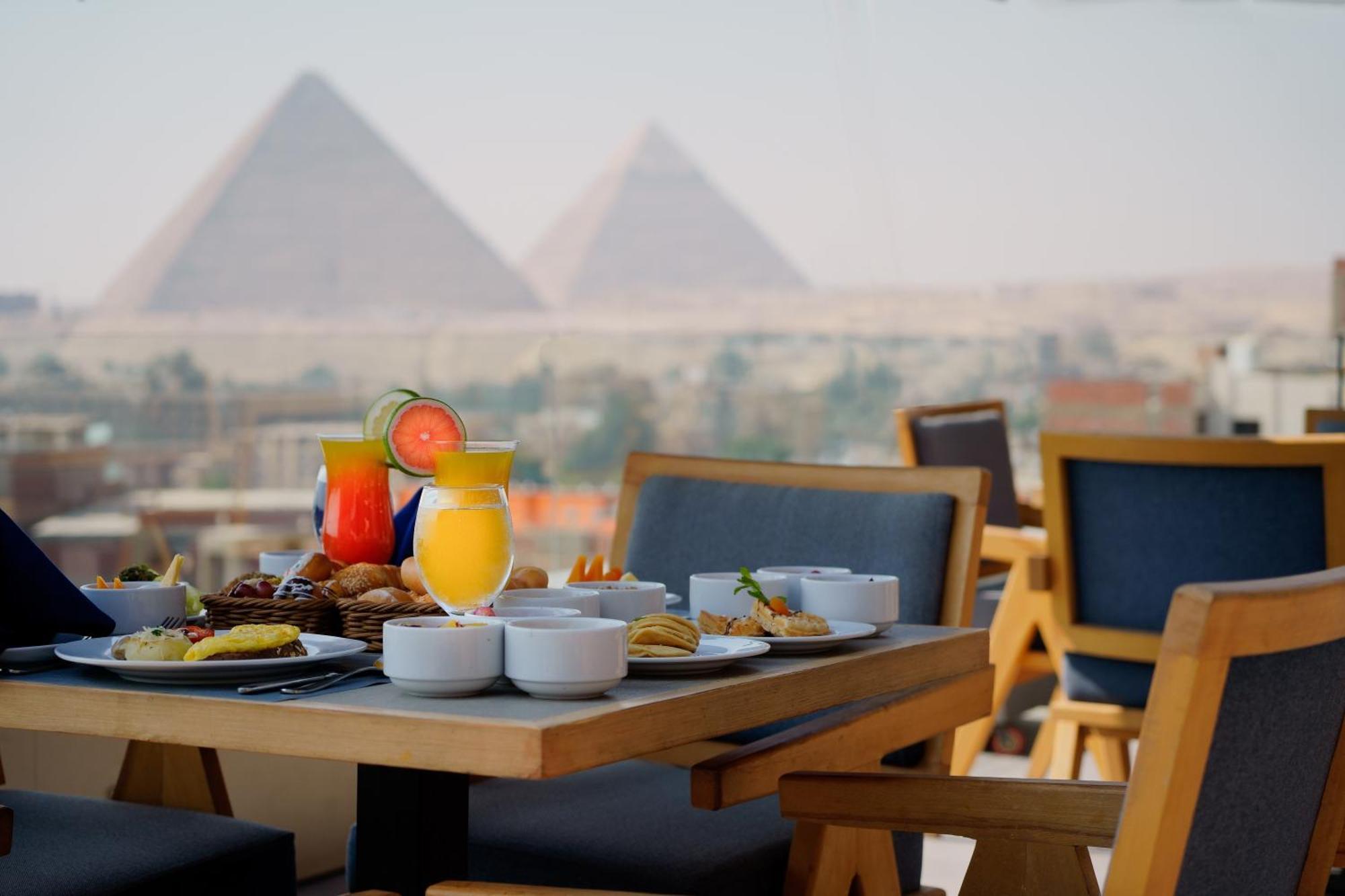 Stay Inn Pyramids Hotel Al Kawm al Akhdar Bagian luar foto