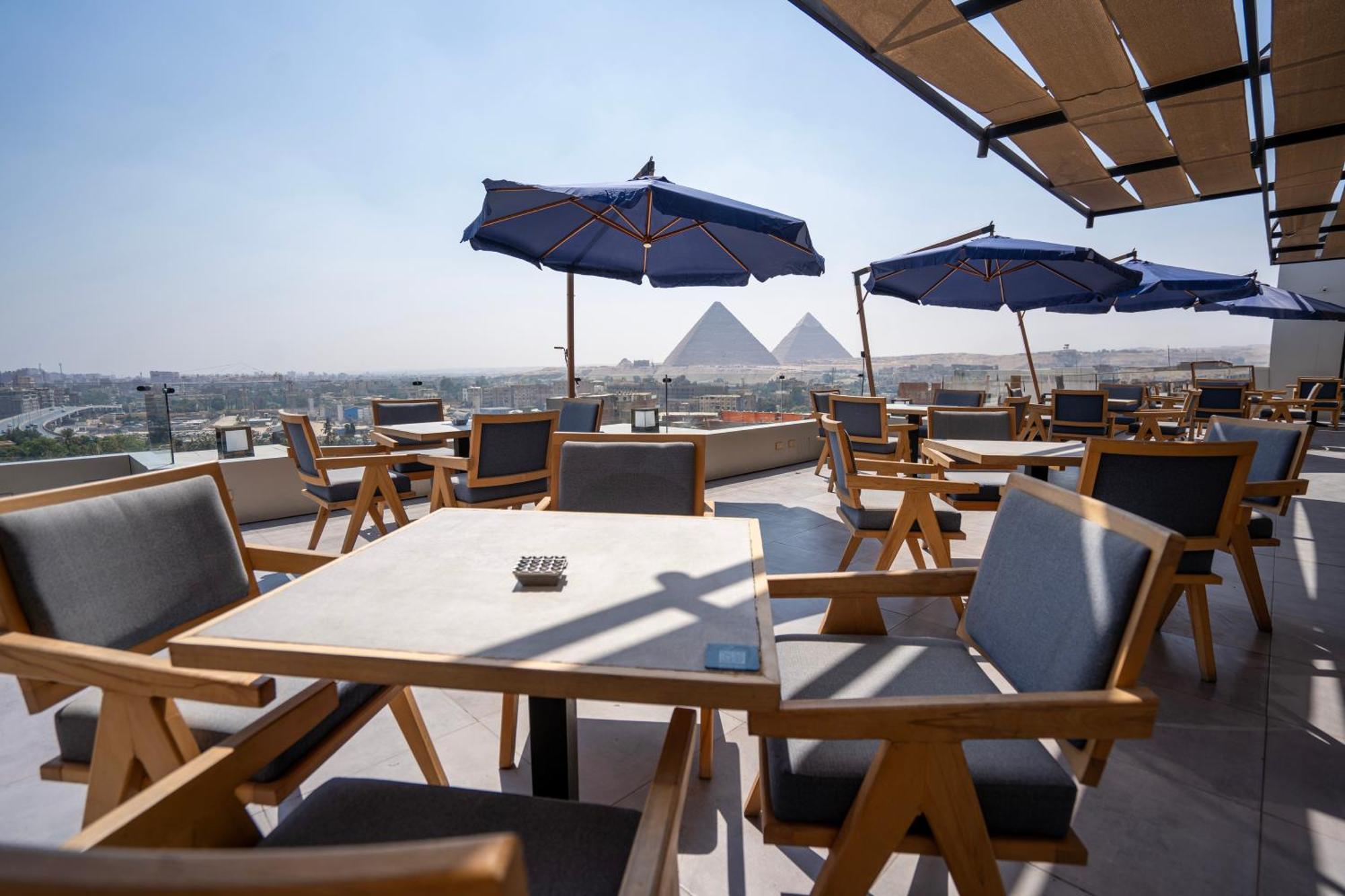Stay Inn Pyramids Hotel Al Kawm al Akhdar Bagian luar foto